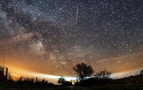The Lyrid meteor shower is seen over Burg on the Baltic Sea island of Fehmarn off Germany, Friday, April 20, 2018. The Lyrids occur every year in mid-