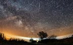 The Lyrid meteor shower is seen over Burg on the Baltic Sea island of Fehmarn off Germany, Friday, April 20, 2018. The Lyrids occur every year in mid-