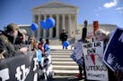 Supporters of legal access to abortion, as well as anti-abortion activists, rally outside the Supreme Court on March 2, 2016, as the Court hears oral 