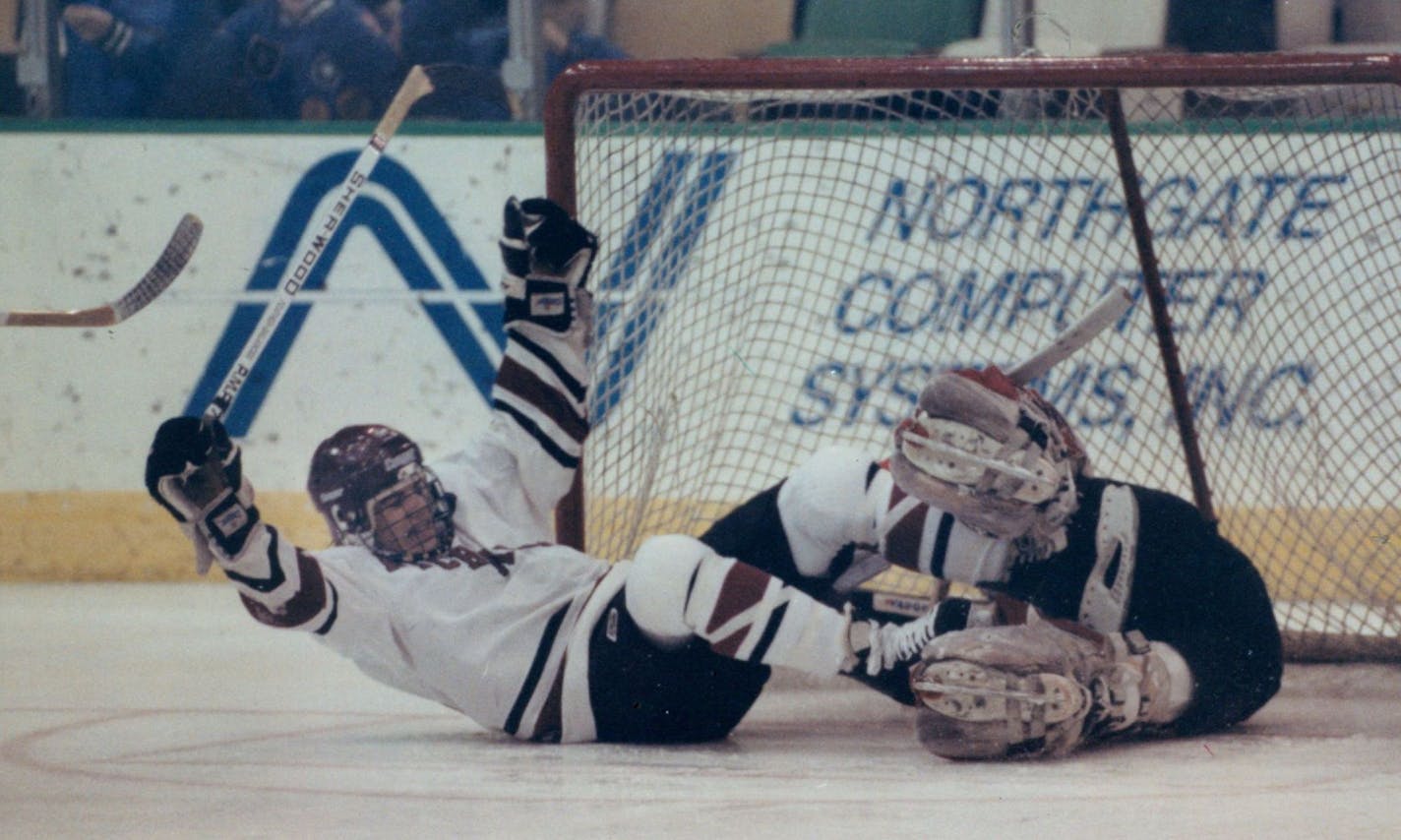 Richfield's Darby Hendrickson celebrated after pushing the puck past Eden prairie goalie Trent Fielder in 1991.