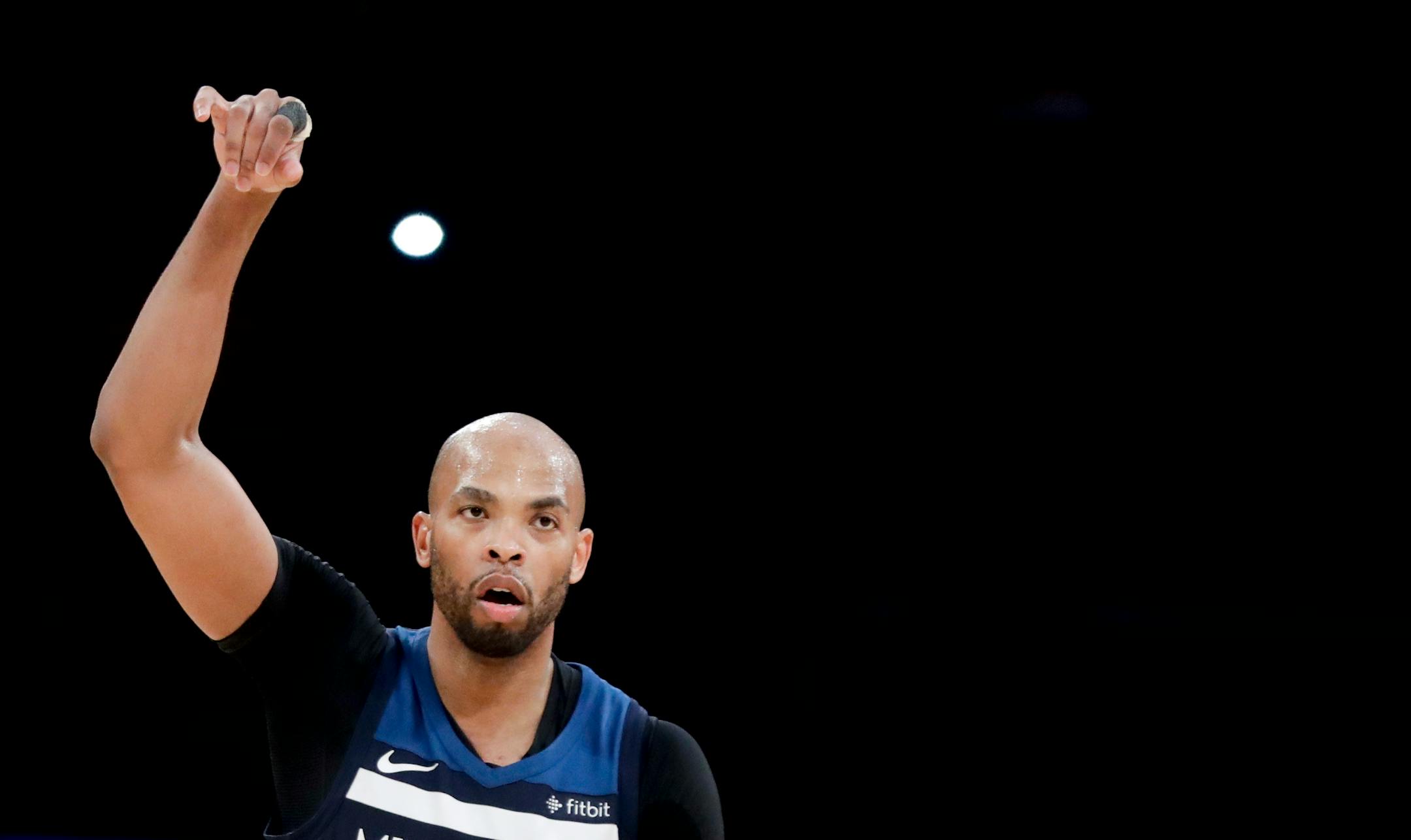 Minnesota Timberwolves forward Taj Gibson celebrates after making a basket against the Los Angeles Lakers during the second half of an NBA basketball game in Los Angeles, Monday, Dec. 25, 2017. The Timberwolves won 121-104. (AP Photo/Chris Carlson)