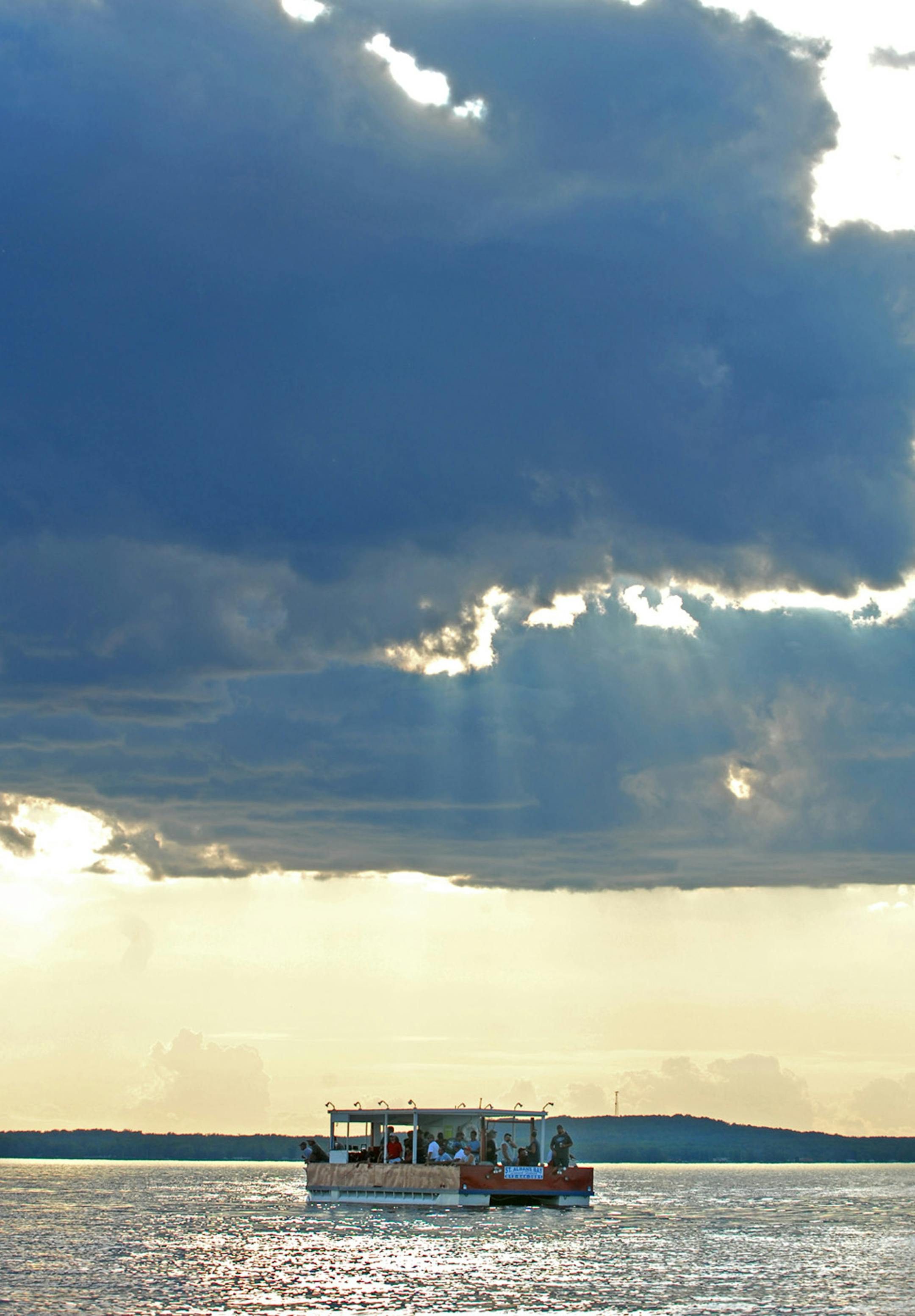 A thunder cloud above Mille Lacs didn't discourage these launch anglers from a night of fishing. Walleye fishing has been generally good on Mille Lacs, improving as weather stabilizes.