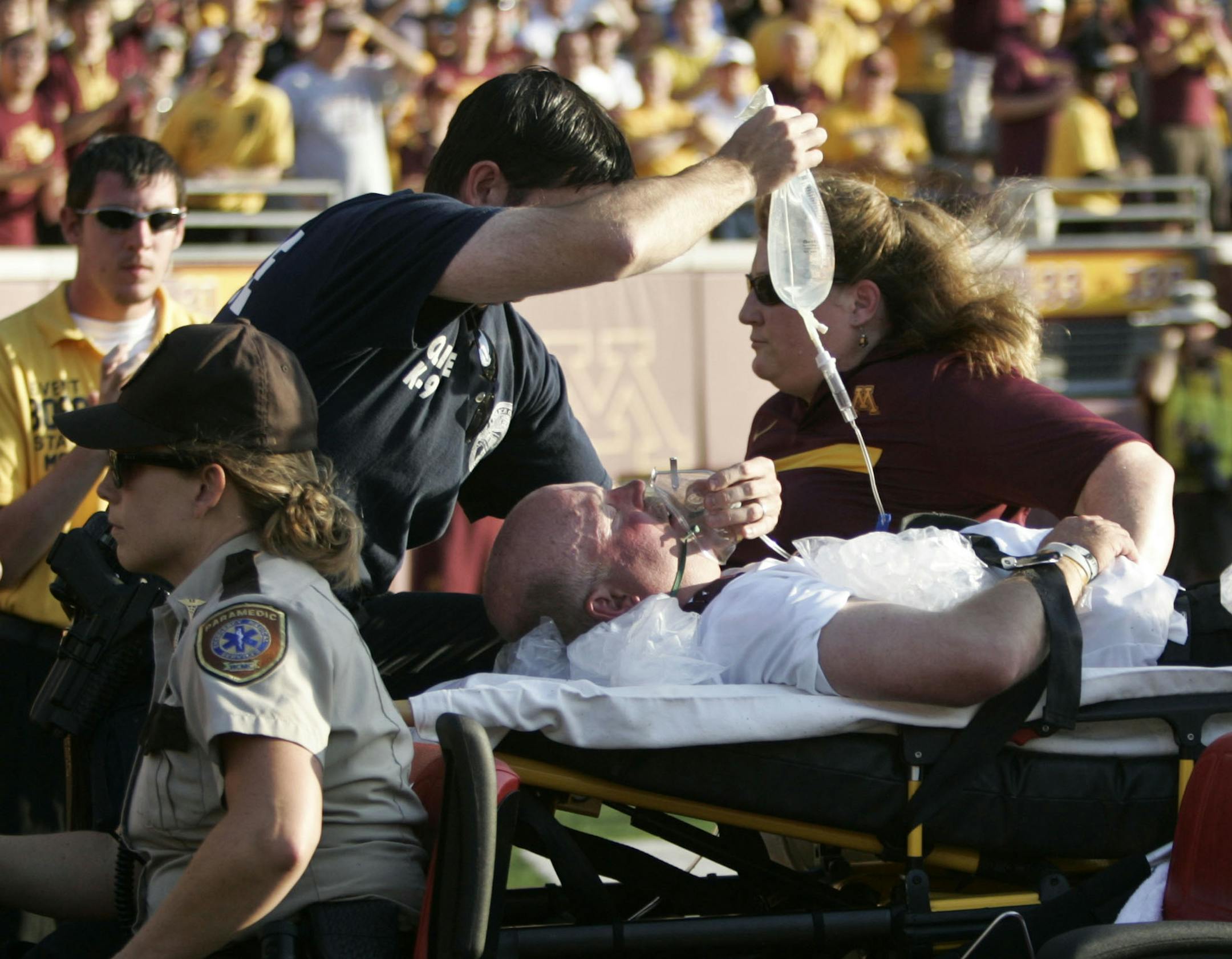 Gopher Head Coach Jerry Kill was carted off by medics after he had a seizure near the end of the game at TCF Bank Stadium in Minneapolis, Minn., Saturday, September 10, 2011. New Mexico State won 28-21. ] (KYNDELL HARKNESS/STAR TRIBUNE) kyndell.harkness@startribune.com