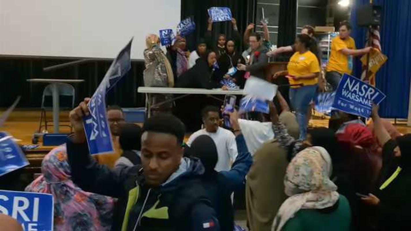 This screenshot from a video shared by blogger John Edwards shows the disorder at the Minneapolis DFL 10th Ward convention May 13 as supporters of City Council candidate Nasri Warsame took over the stage and tussled with convention organizers and supporters of Council Member Aisha Chughtai.