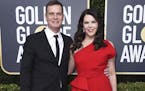 Peter Krause, left, and Lauren Graham arrive at the 77th annual Golden Globe Awards at the Beverly Hilton Hotel on Sunday, Jan. 5, 2020, in Beverly Hi