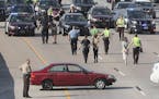Protestors blocked and were arrested on the southbound interstate on 35W near the University Avenue bridge, Wednesday, July 13, 2016 in Minneapolis, M