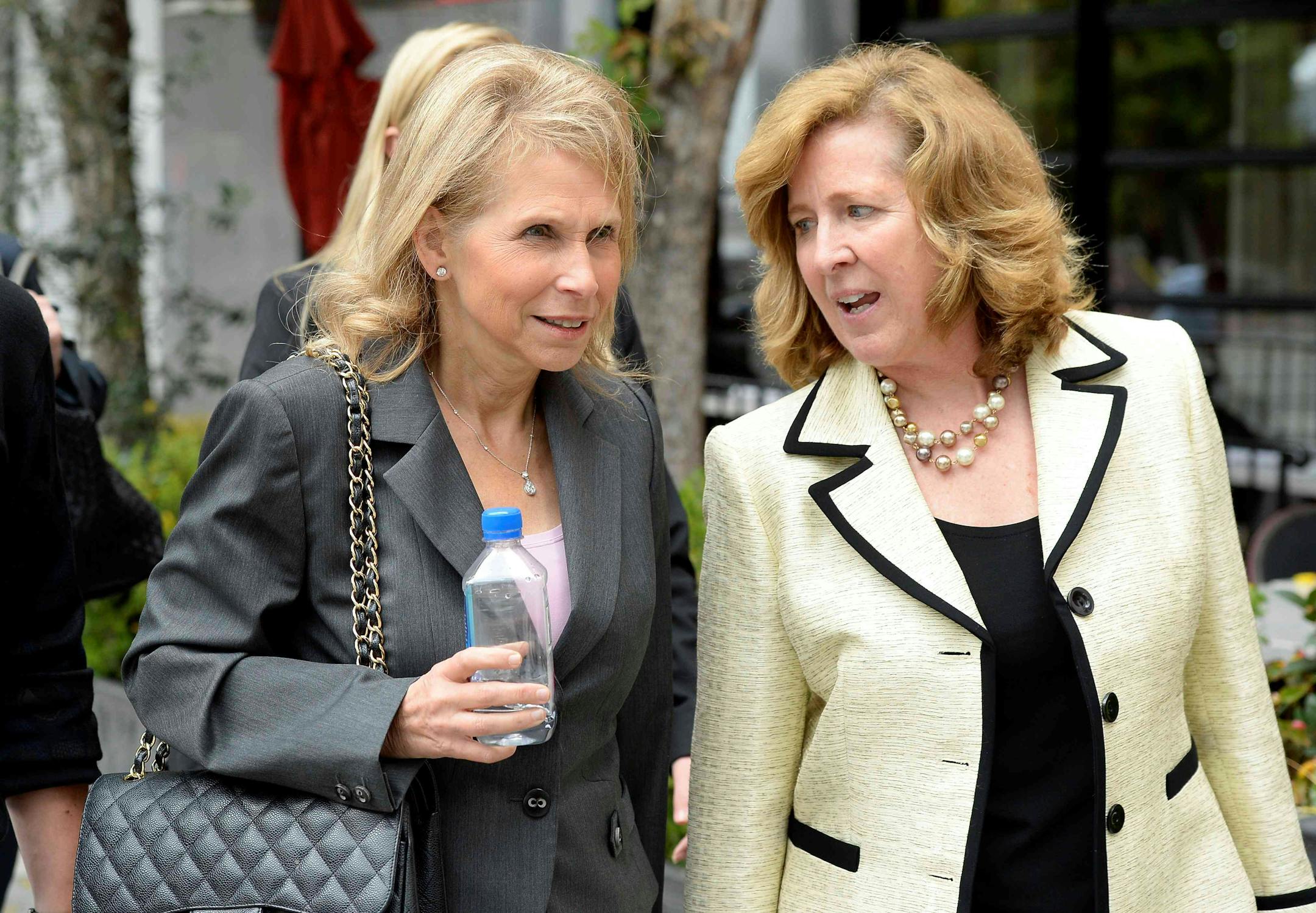 Sumner Redstone's daughter Shari Redstone(L) and her attorney Elizabeth Burnett leave a downtown courthouse where her father's former girlfriend Manuela Herzer is suing the 92 year-old controlling shareholder of Viacom and CBS in Los Angeles, California May 6, 2016. REUTERS/Kevork Djansezian/File Photo