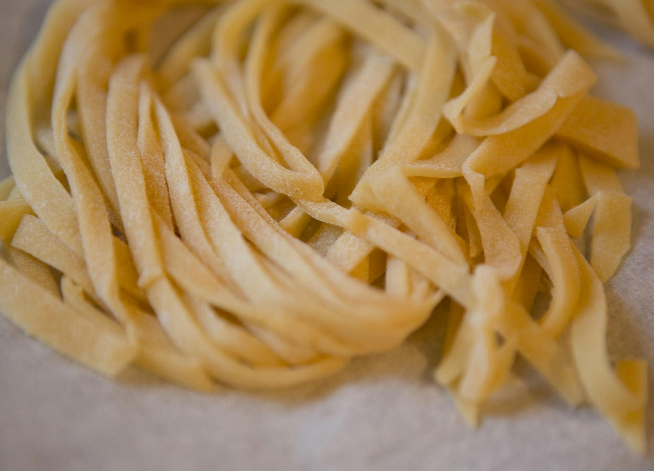 Photo by Mirra Fine, the Perennial Plate Making fresh pasta in Marche, Italy.