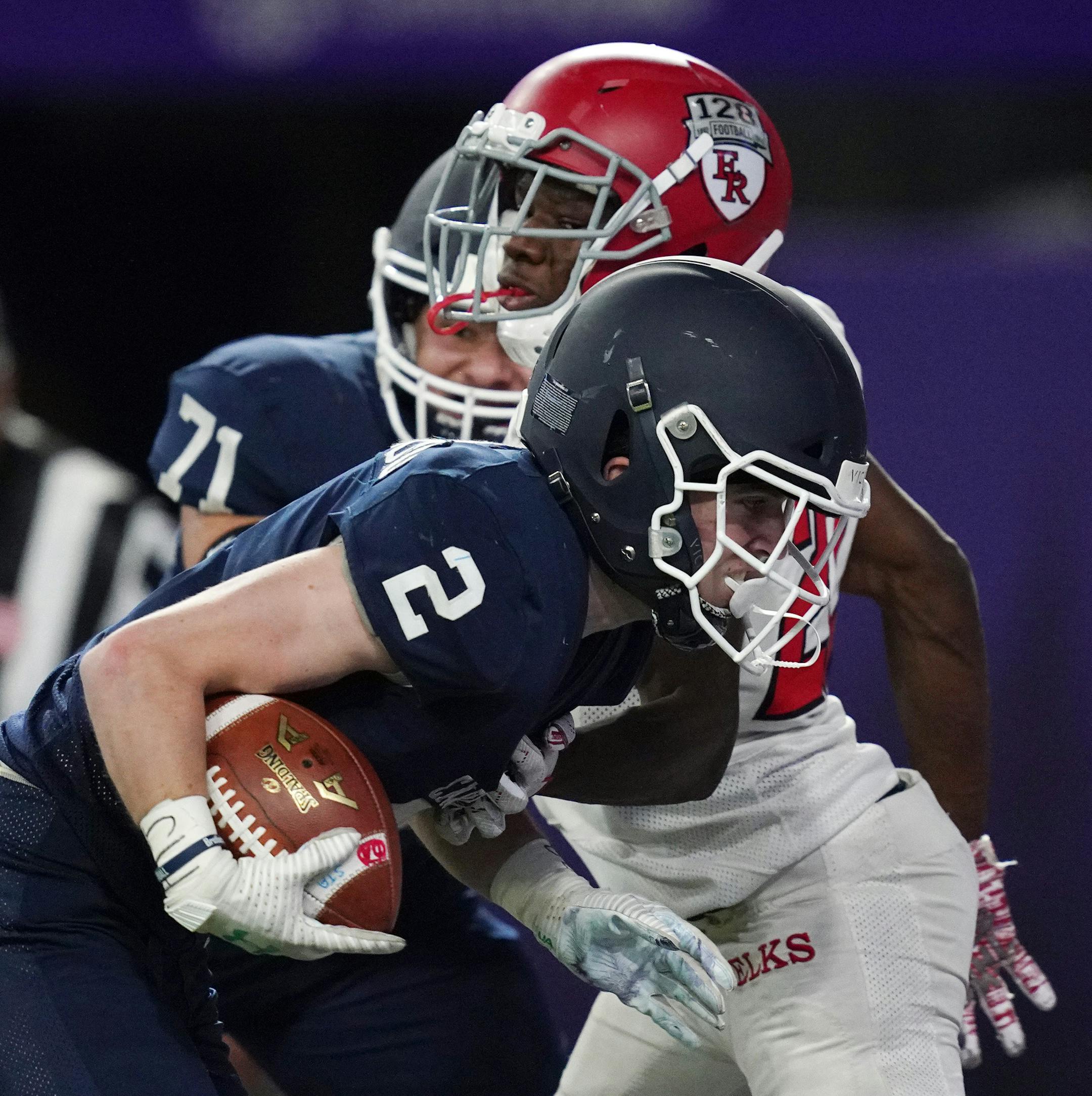 St. Thomas Academy running back Danny McFadden (2) got the two point conversion after he scored a touchdown in the first half. ] ANTHONY SOUFFLE • anthony.souffle@startribune.com Elk River High School played St. Thomas Academy in an MSHSL Class 5A semifinal football game Saturday, Nov. 16, 2019 at U.S. Bank Stadium in Minneapolis.