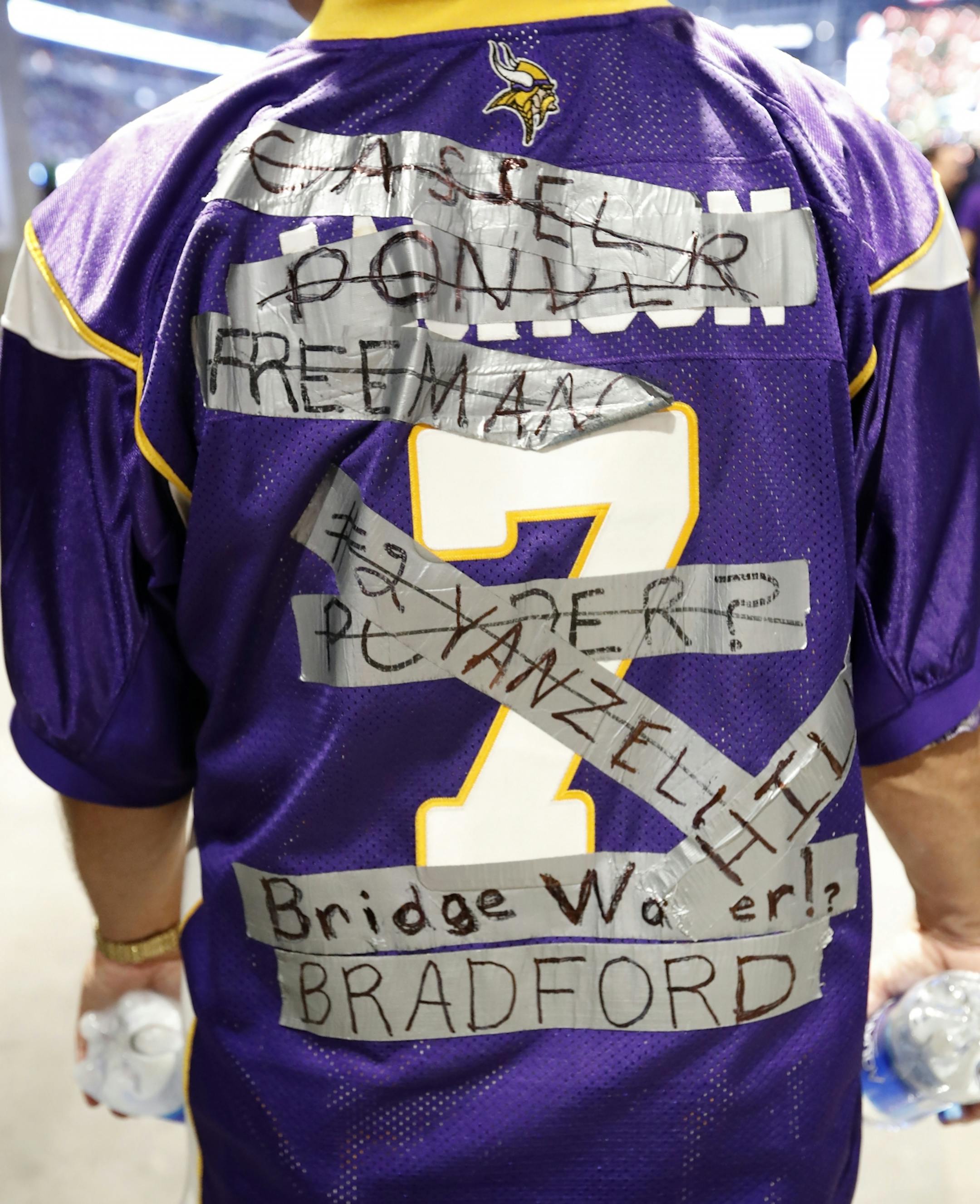 A fan covered up his jersey with the names of multiple Vikings quarterbacks.