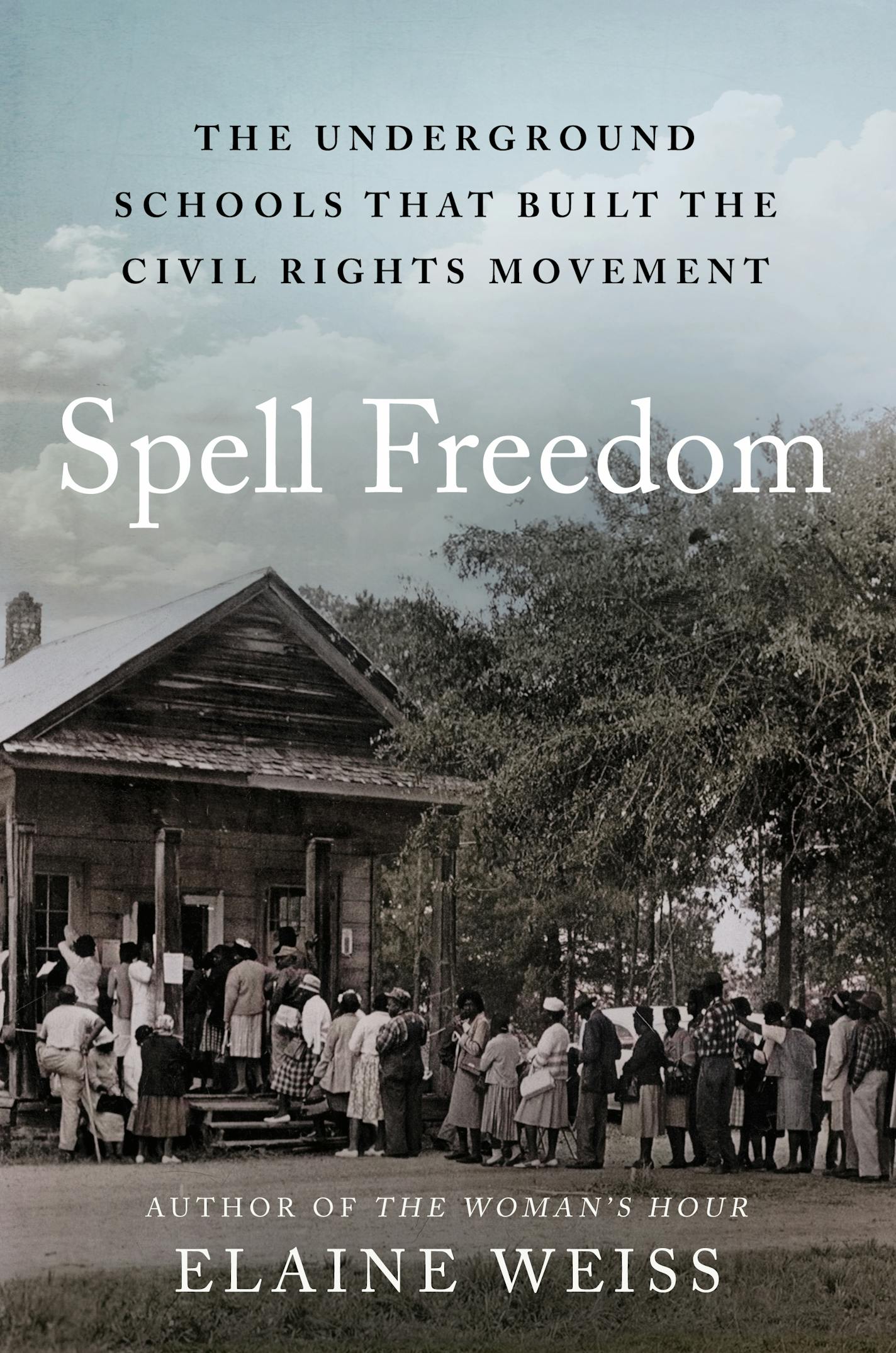 cover of Spell Freedom is a black and white photo of a line of people outside a small wooden building