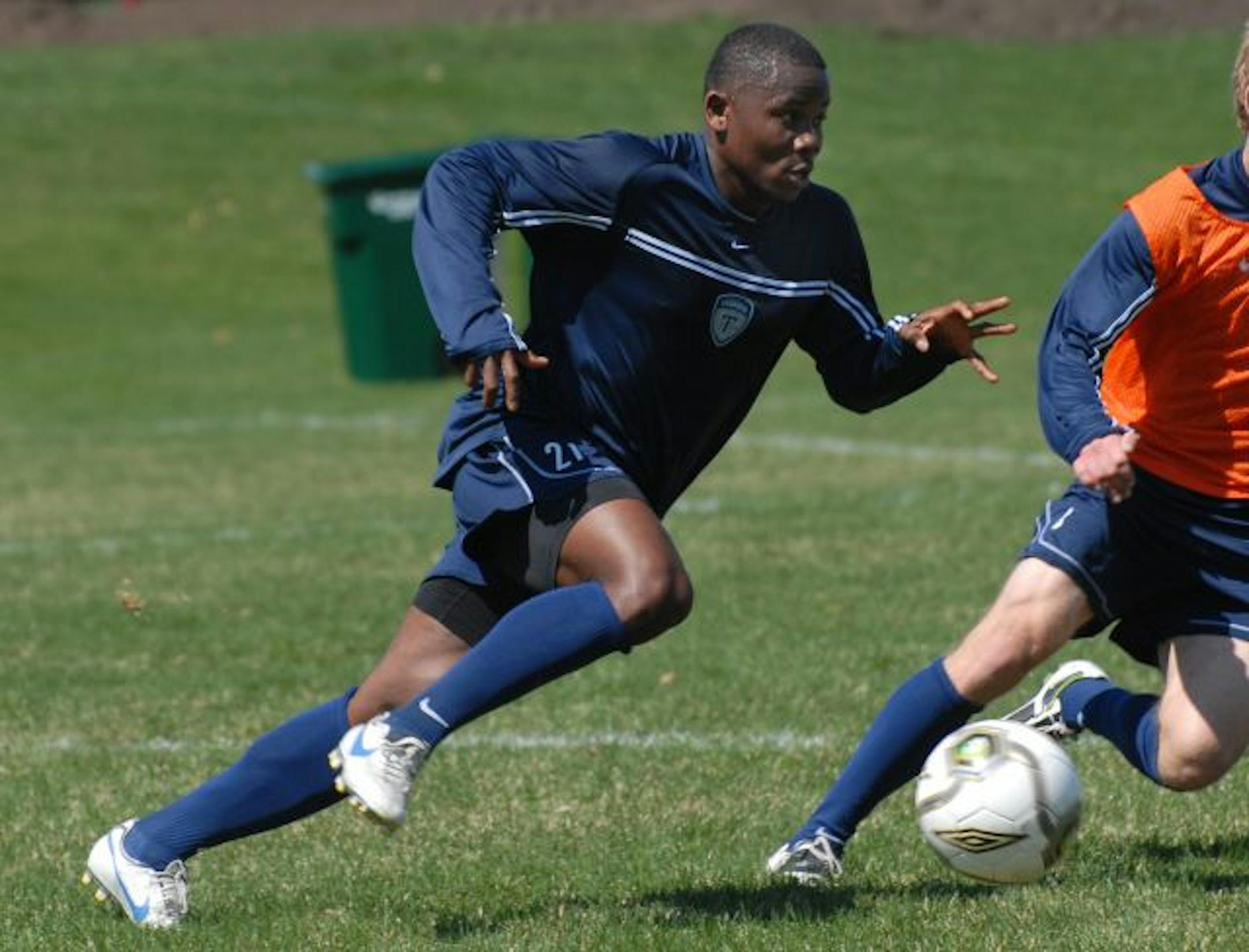 Soccer player for the Minnesota Thunder Geoffrey Myers during a morning workout