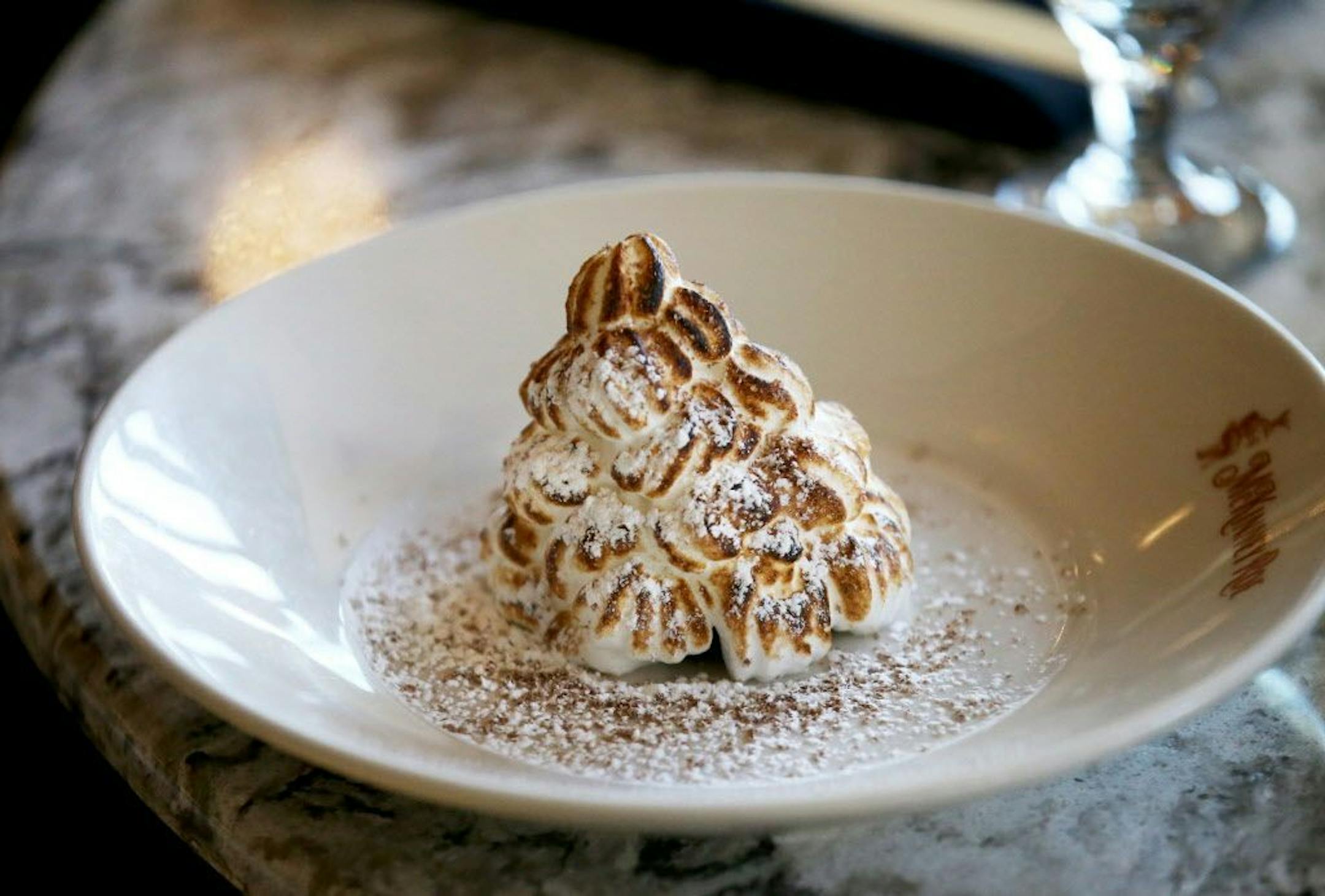 Baked Alaska at McKinney Roe with Boca Negra cake, chocolate nut ice cream and toasted marshmellow Thursday, Nov. 1, 2018, in Minneapolis, MN.
