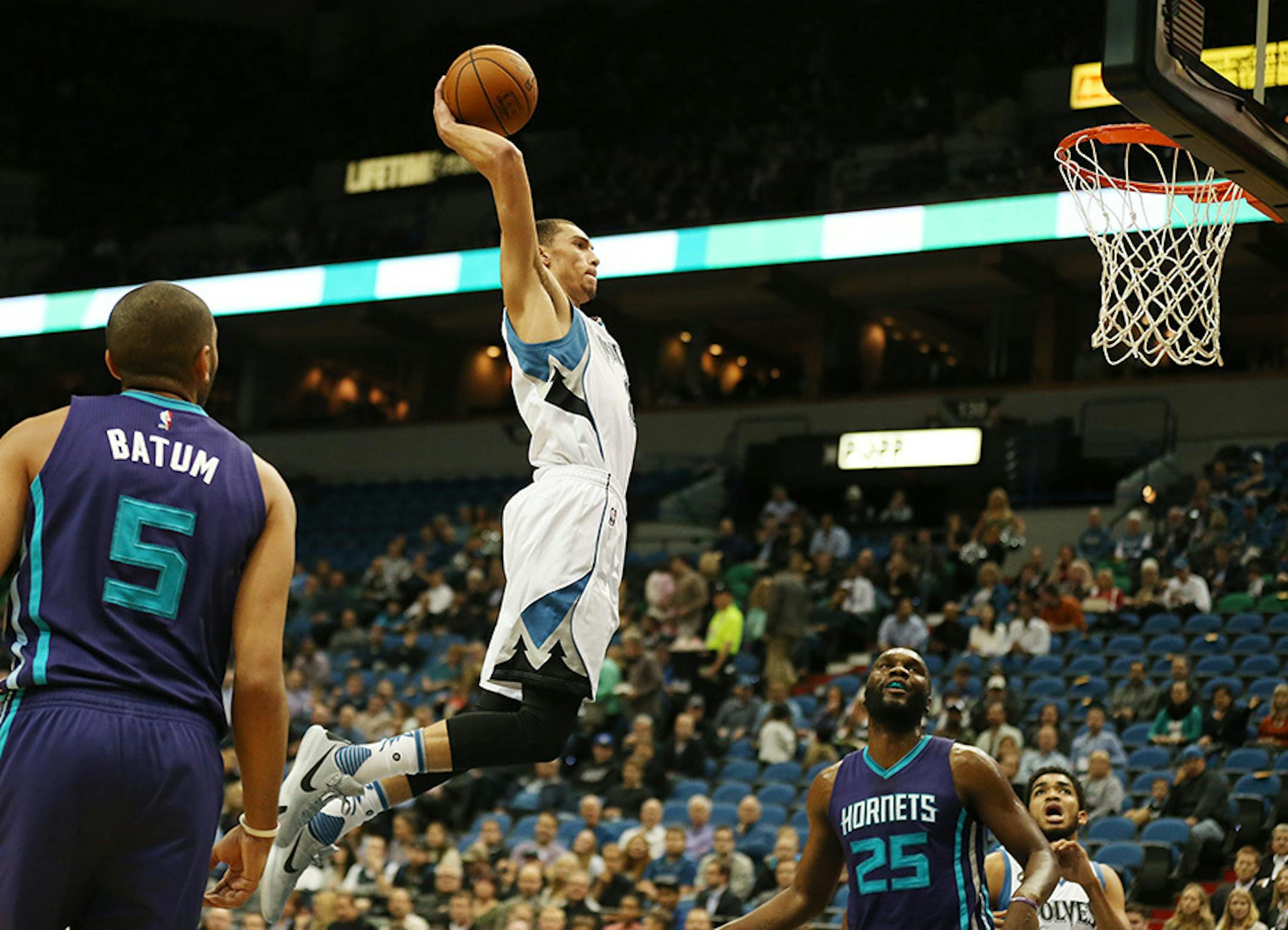 Minnesota Timberwolves guard Zach LaVine (8) dunked on Charlotte Hornets center Al Jefferson (25) at Target Center Tuesday November 10, 2015 in Minneapolis, MN.