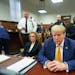Former President Donald Trump, joined by his attorney Susan Necheles, left, sits at the defense table in Manhattan criminal court, Tuesday, May 7, 202
