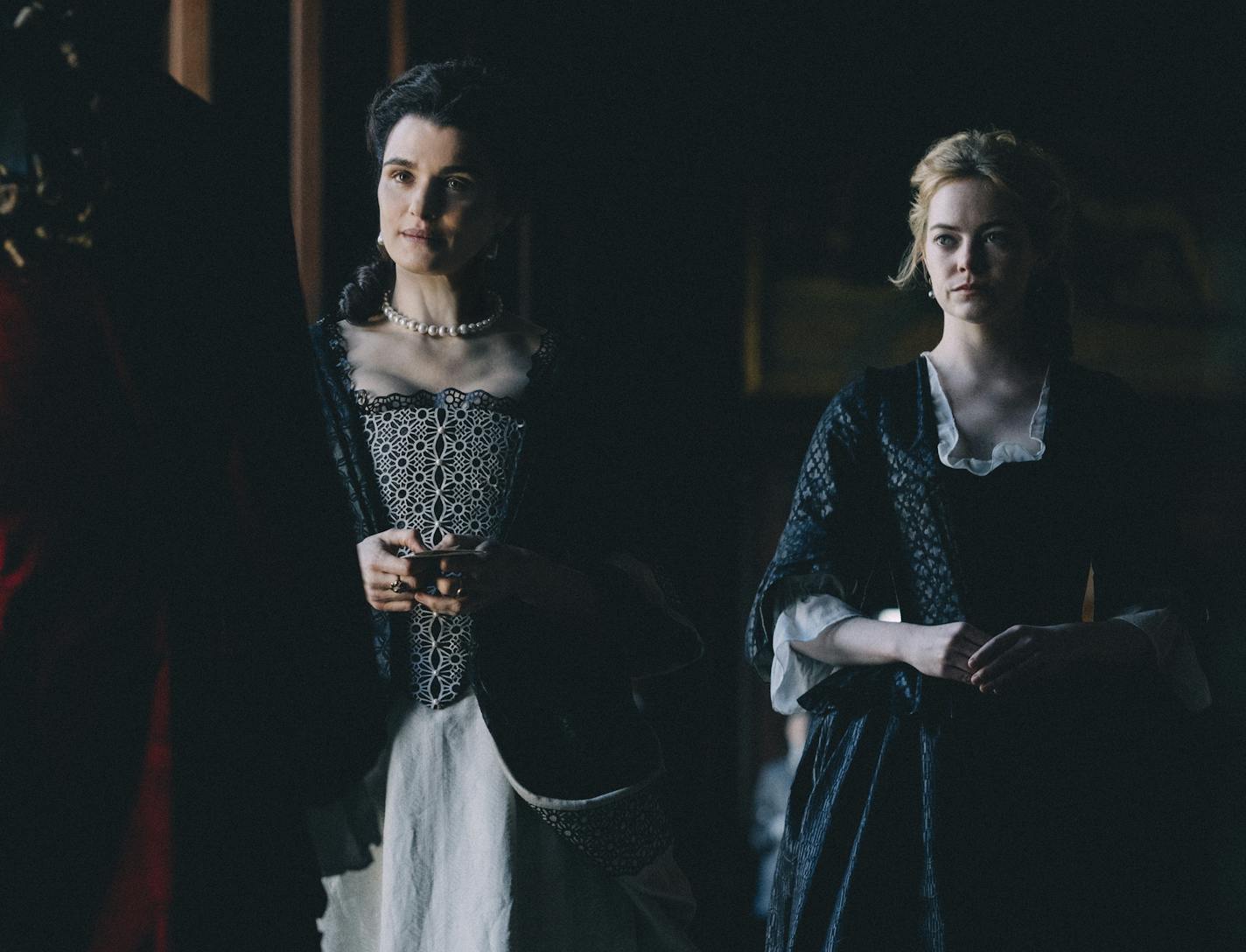 Rachel Weisz and Emma Stone in the film THE FAVOURITE. Photo by Atsushi Nishijima.&#xa0;&#xa9; 2018 Twentieth Century Fox Film Corporation All Rights Reserved