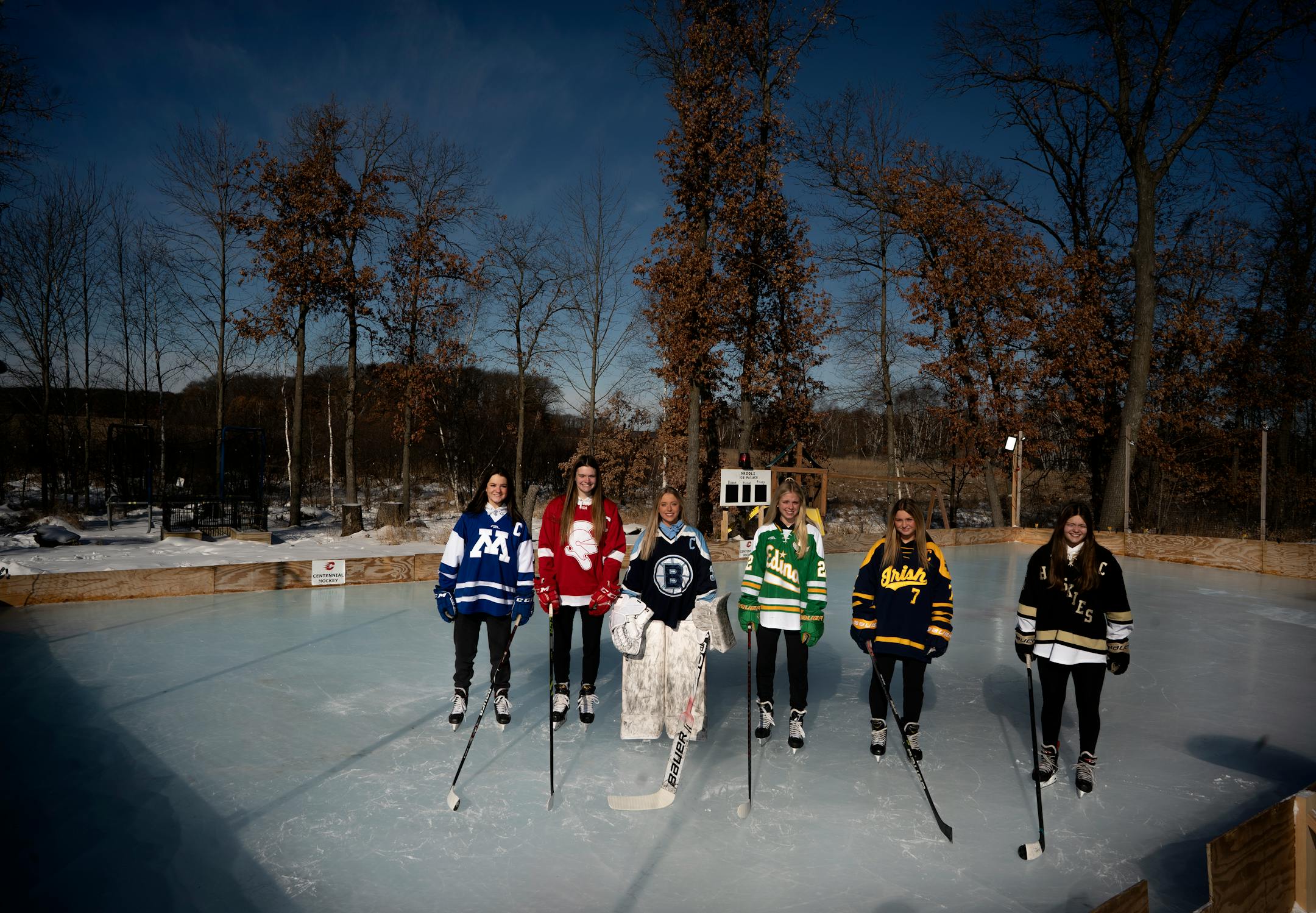 Grace Sadura (Minnetonka), left Emma Peschel (Benilde),Hailey Hansen (Blaine),Vivian Jungels (Edina),Whitney Tuttle (Rosemount) and Ella Boerger (Andover) All Metro girl's hockey team in Circle Pines, Minn., on Sunday, Feb. 13, 2022.