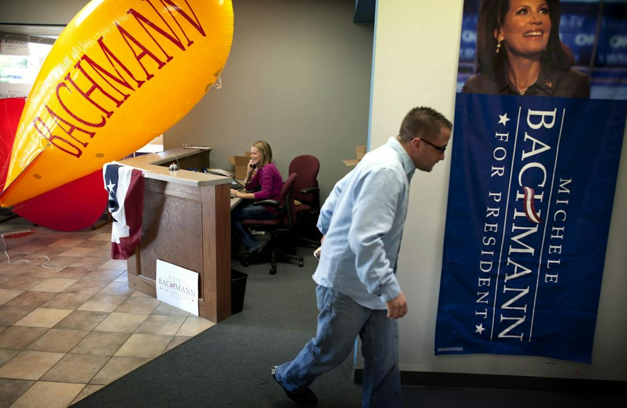 Michele Bachmann's senior political adviser and former chief of staff, Andy Parrish, and intern Becky Howe at work at Bachmann's Iowa campaign headquarters in Urbandale, a Des Moines suburb.