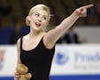 Gracie Gold points to the crowd after she performed in the ladies short program at the Skate America figure skating competition Friday, Oct. 23, 2015,