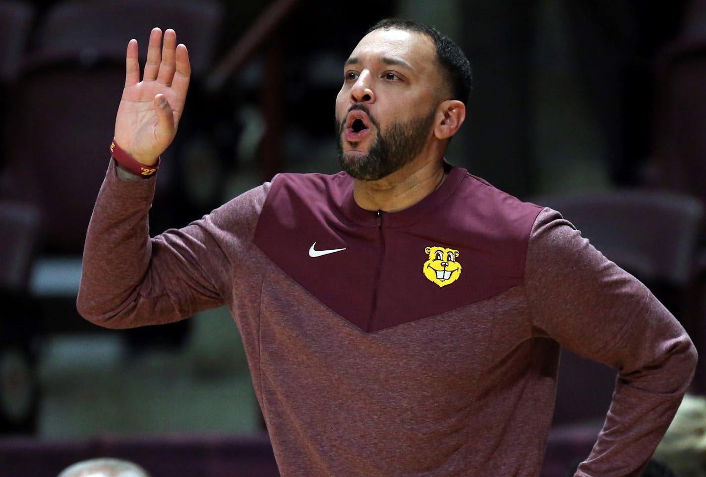 Minnesota head coach Ben Johnson reacts in the first half of an NCAA college basketball game against Virginia Tech in Blacksburg, Va., Monday, Nov. 28, 2022. (Matt Gentry/The Roanoke Times via AP)