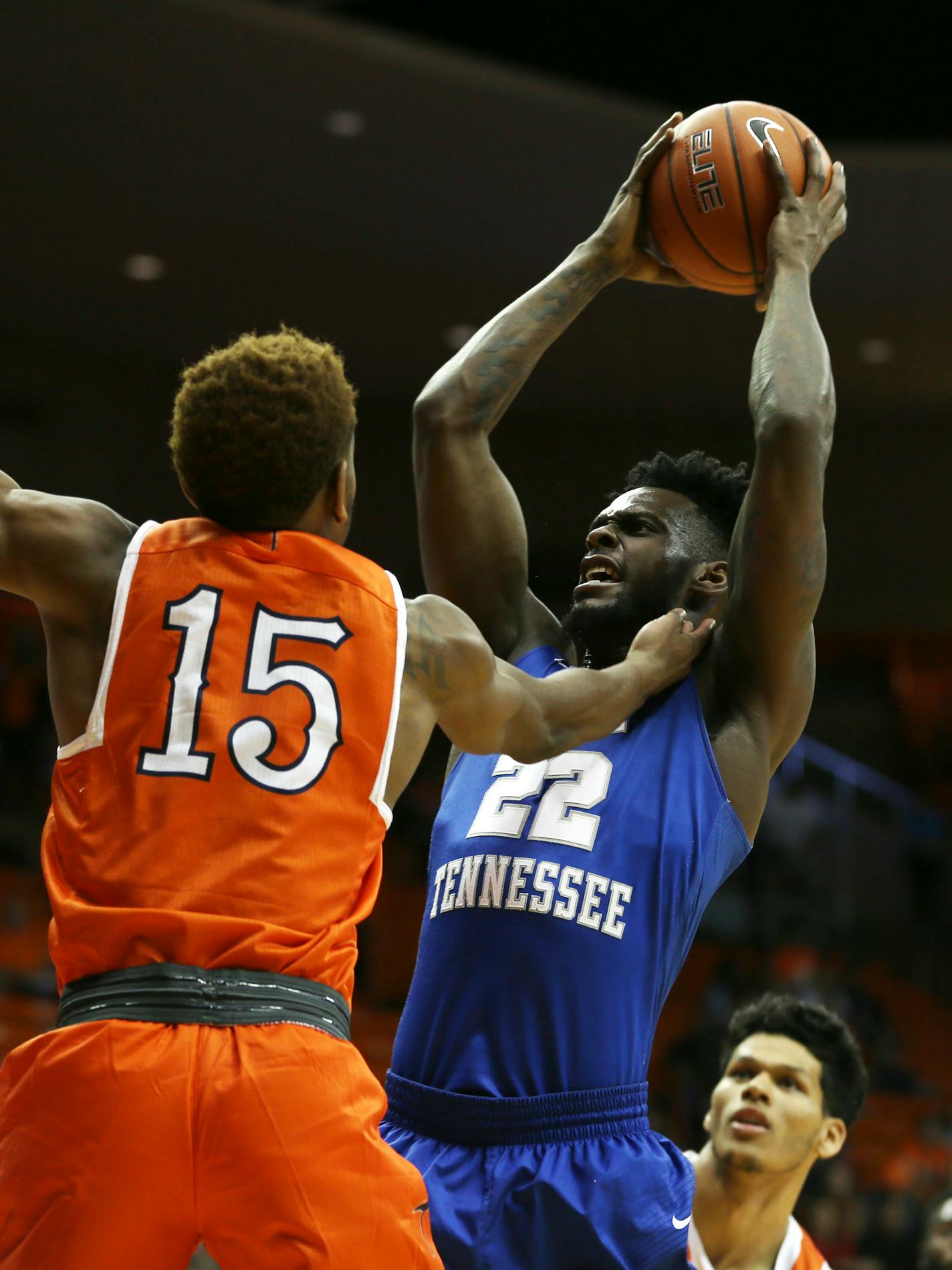 Middle Tennessee's JaCorey Williams, center, grabs a rebound between UTEP's Domionic Artis, left, and Paul Thomas during the first half of an NCAA college basketball game Saturday, Feb. 4, 2017, in El Paso, Texas. (Victor Calzada/The El Paso Times via AP)