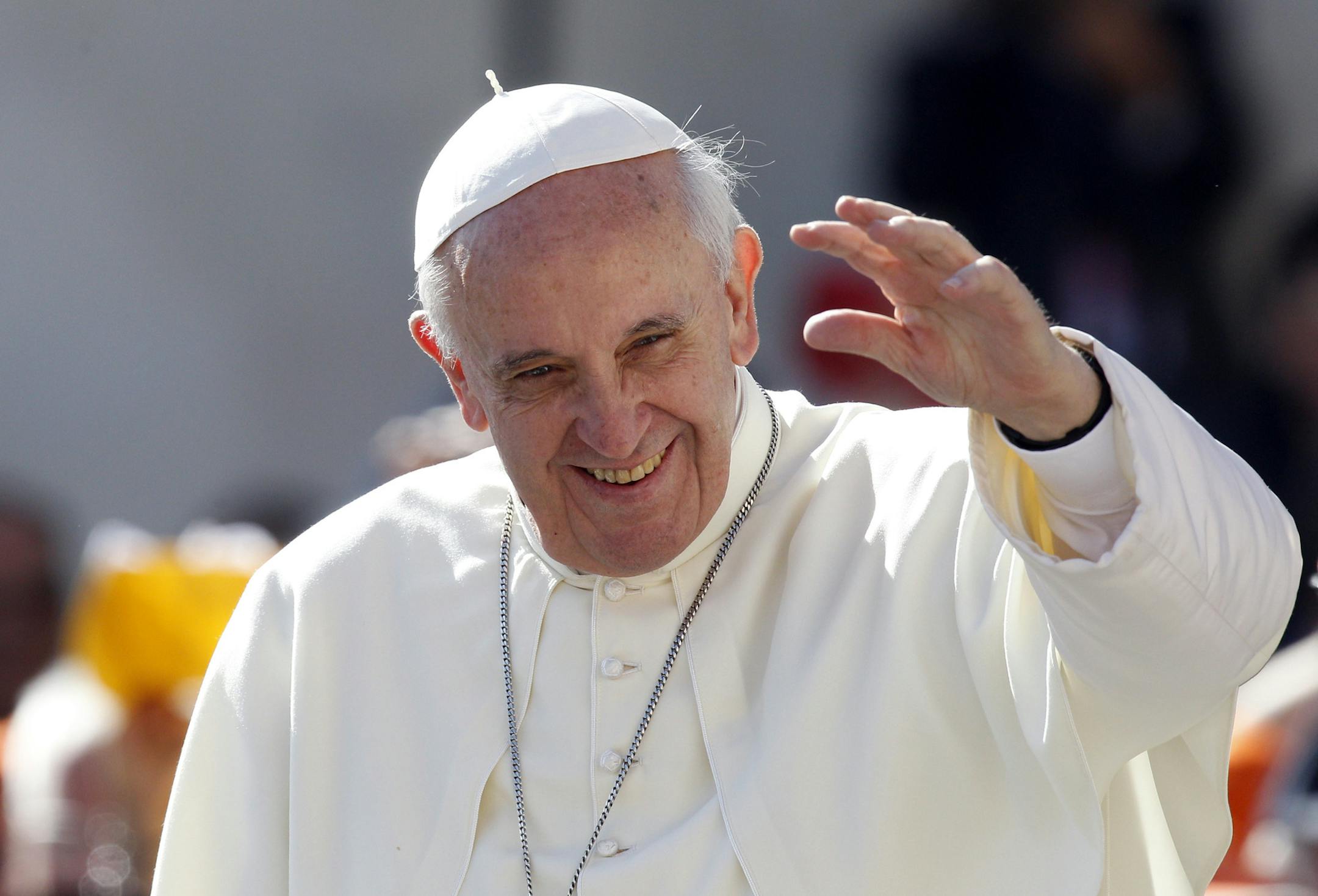 FILE - In this Sept. 18, 2013 file photo, Pope Francis waves to faithful as he arrives for his weekly general audience in St. Peter's Square at the Vatican. Pope Francis convenes his parallel cabinet on Tuesday, Oct. 1, 2013, for a first round of talks on reforming the Catholic Church, bringing eight cardinals from around the globe together in a novel initiative to get local church leaders involved in helping make decisions for the 1.2-billion strong universal Catholic Church. (AP Photo/Riccardo