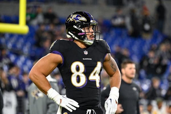 Baltimore Ravens tight end Josh Oliver (84) looks on during pre-game warm-ups before an NFL football game against the Pittsburgh Steelers, Sunday, Jan