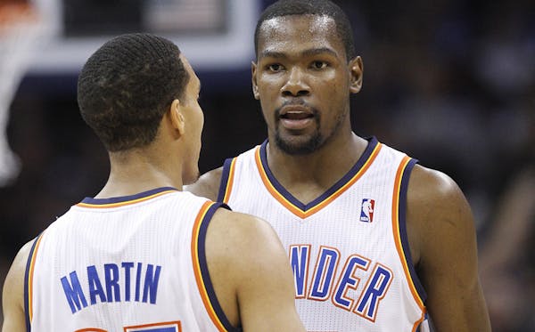 Kevin Martin talked with Oklahoma City Thunder superstar and then-teammate Kevin Durant last season. SUE OGROCKI