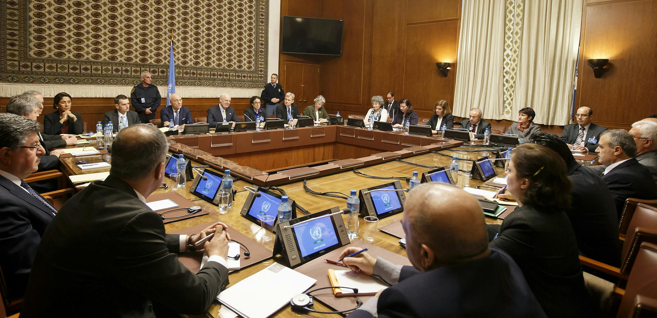 Overview of the Syria peace talks at the European headquarters of the United Nations in Geneva, Switzerland, Monday, Feb. 1, 2016. Members of the main Syrian opposition group said Monday they plan to give U.N. envoy Staffan de Mistura a "roadmap" for implementation of their humanitarian demands on Syria that they say must happen before they formally join indirect peace talks with a government delegation in Geneva. (Salvatore Di Nolfi/Keystone via AP) ORG XMIT: MIN2016021813035446