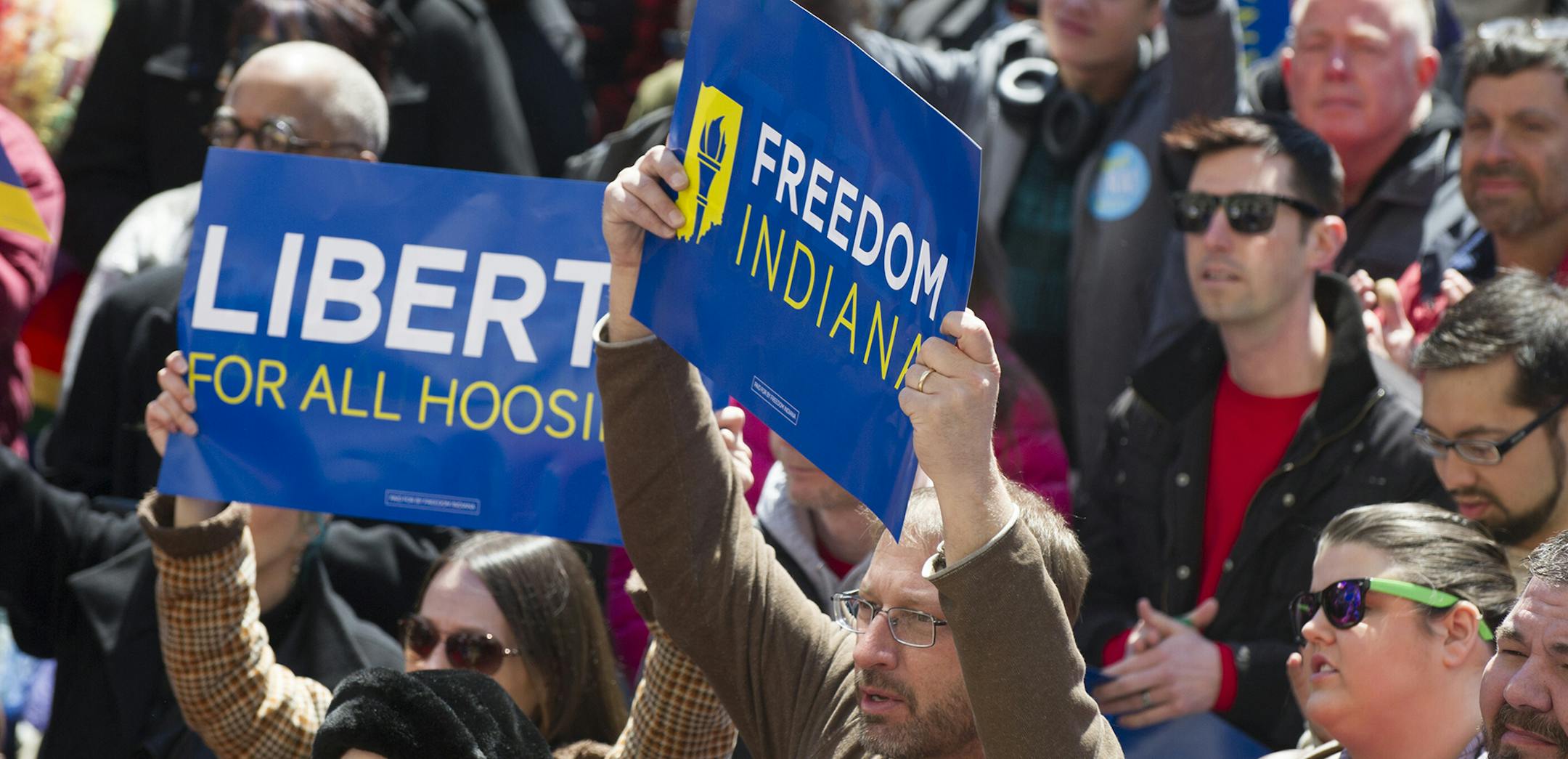 Thousands of opponents of Indiana Senate Bill 101, the Religious Freedom Restoration Act, gathered on the lawn of the Indiana State House to rally against that legislation Saturday, March 28, 2015. Republican Gov. Mike Pence signed a bill Thursday prohibiting state laws that "substantially burden" a person's ability to follow his or her religious beliefs. (AP Photo/Doug McSchooler) ORG XMIT: MIN2015032814333706