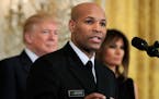 FILE - In this Feb. 13, 2018, file photo, Surgeon General Jerome Adams speaks during a National African American History Month reception hosted by Pre