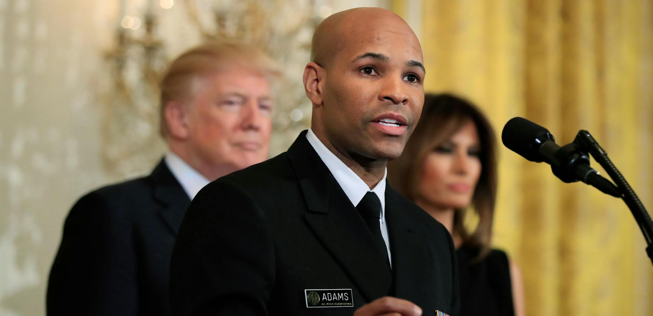 FILE - In this Feb. 13, 2018, file photo, Surgeon General Jerome Adams speaks during a National African American History Month reception hosted by President Donald Trump and first lady Melania Trump in the East Room of the White House in Washington. The nation's chief doctor wants more Americans to start carrying the overdose antidote naloxone in an effort to combat the nation's opioid crisis. U.S. Surgeon General Dr. Adams is expected to speak about the public health advisory Thursday, April 5,