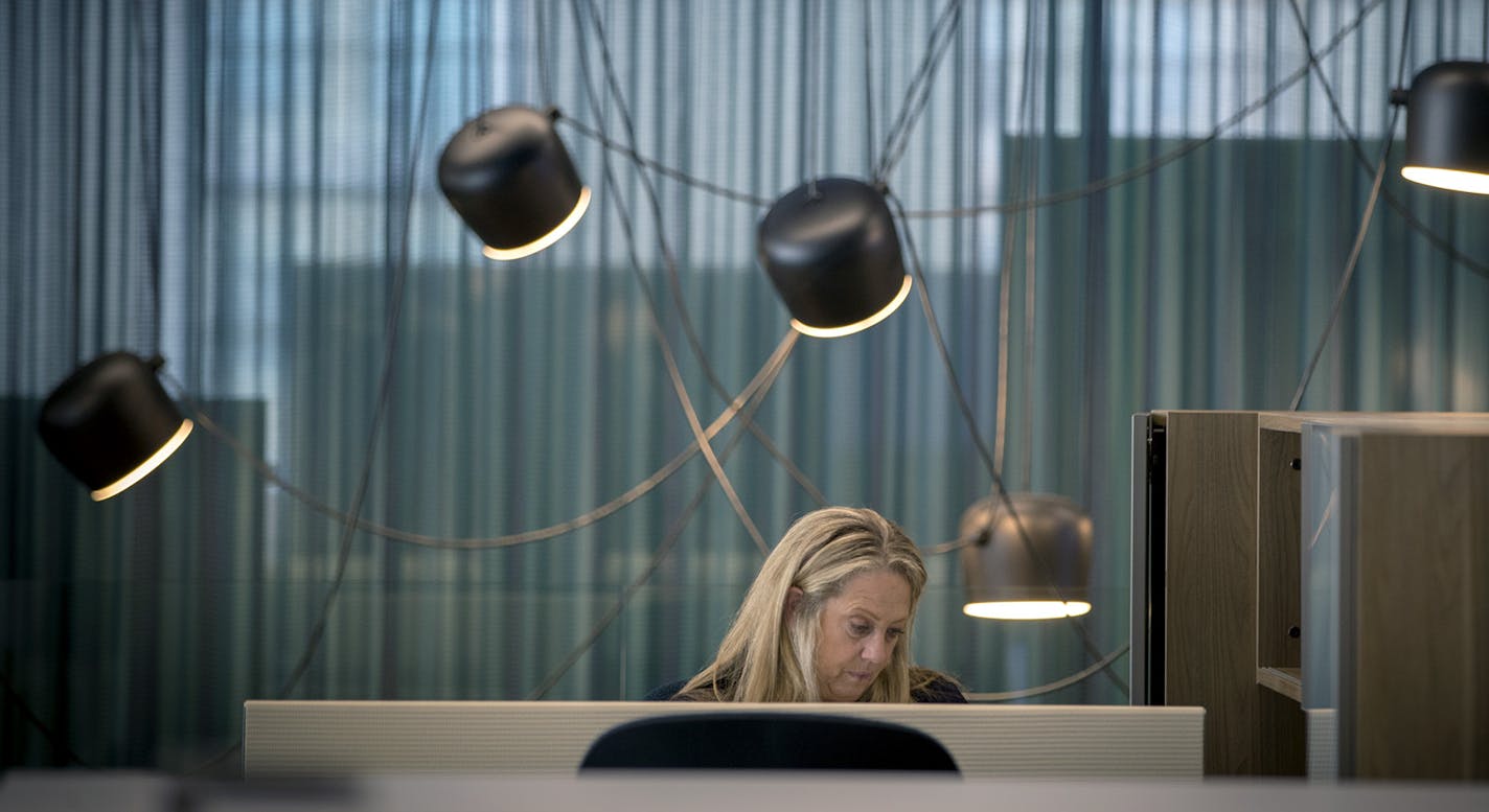 Pat Larson, who works in sales at Atmosphere, worked from her desk, Wednesday, September 6, 2017 in Minneapolis, MN. ] ELIZABETH FLORES &#xef; liz.flores@startribune.com