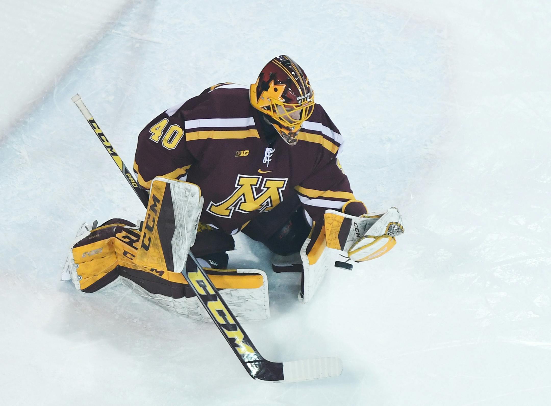 Minnesota goaltender Mat Robson stops a Penn State shot during Friday's Big Ten Quarterfinals Game 1 at Univesity Park, Pa. Penn State defeated Minnesota, 5-3. (Photo by Steve Manuel)