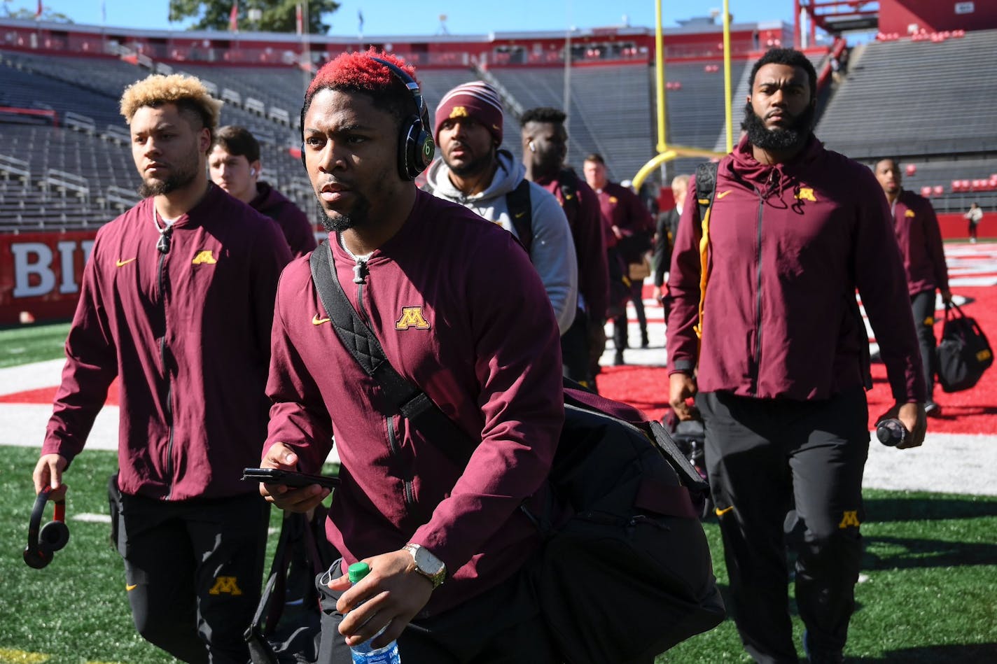 Gophers players arrived at the stadium before Saturday's game at Rutgers.