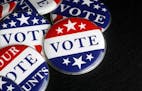 iStock Red, white, and blue vote buttons.