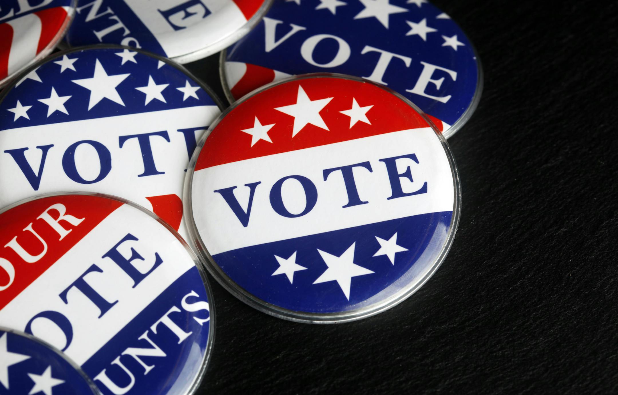 iStock Red, white, and blue vote buttons.