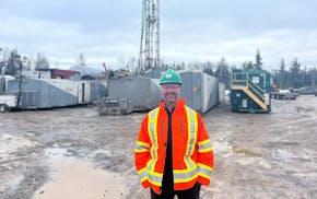 Pulsar CEO Thomas Abraham-James stands in front of the company's Jetstream #1 helium exploration facility in Babbitt on the Iron Range.