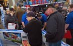 At the Ridgedale Best Buy in Minnetonka, sales were brisk, especially for tv sets when the doors opened for Black Friday .]Richard Tsong-Taatarii/rtso