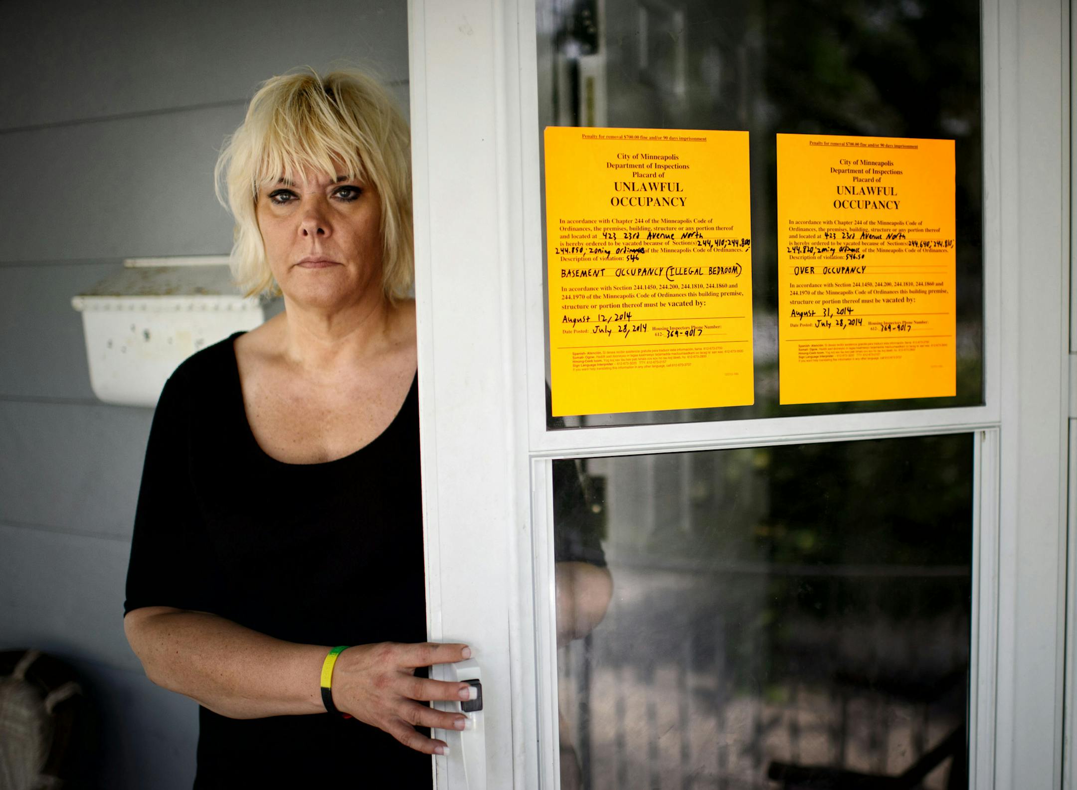 Kolleen Boyd is seeking nonprofit status for MCJ Housing service. She leases three homes and rents rooms out to people whose criminal past makes it hard to find any other housing options. Minneapolis inspectors cited one of her homes with a violation on Monday, July 28. Don DeAngelo is one of her tenants. ] Thursday, July 31, 2014. GLEN STUBBE * gstubbe@startribune.com