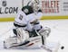 Minnesota Wild goalie Ilya Bryzgalov makes a save during the second period of the NHL hockey game against the New York Islanders, Tuesday, March 18, 2