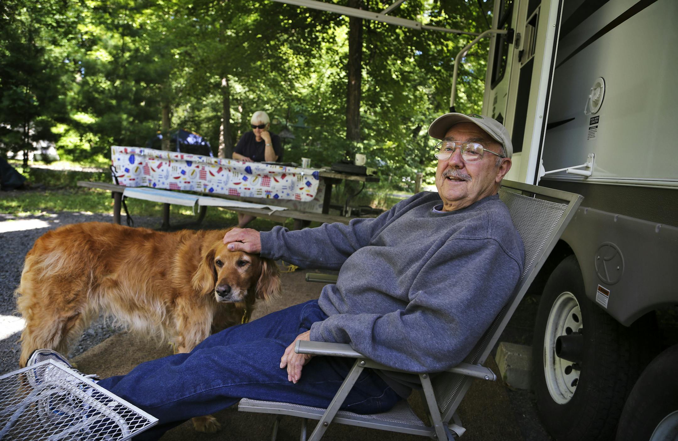 Allen and Marge Bjerke, a retired Minnnetonka couple, are campground hosts at William O&#x2019;Brien State Park. Casey, a golden retriever, enjoys the outdoor lifestyle, too, as well as pats on the head.