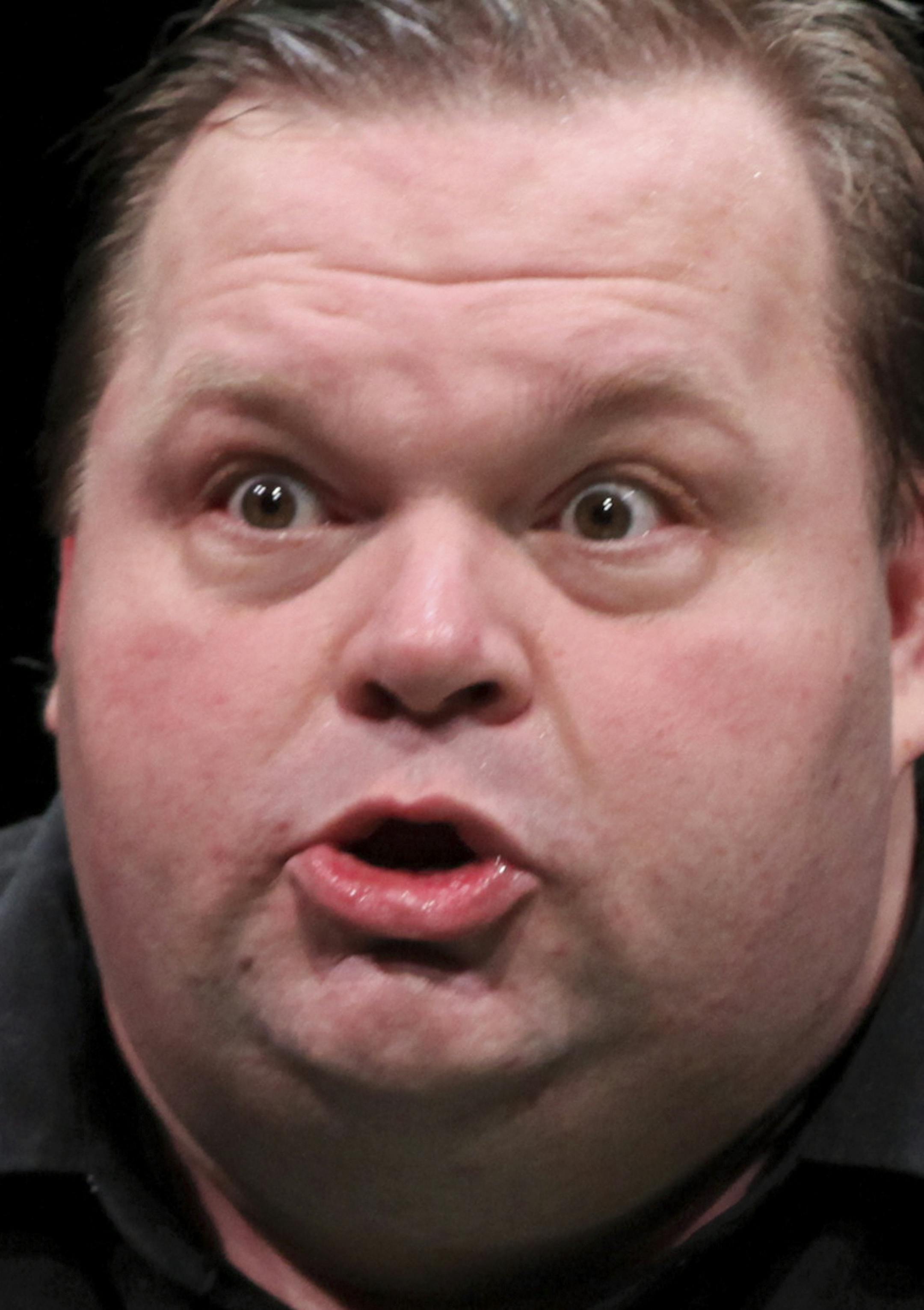 FILE -- Mike Daisey in "The Agony and the Ecstasy of Steve Jobs," at the Public Theater in New York, Oct. 9, 2011. The controversy that has erupted over Daisey's solo stage show raises a knotty issue that deserves examination in the light of the increasingly blurred lines, in various media, between entertainment and journalism. (Sara Krulwich/The New York Times)