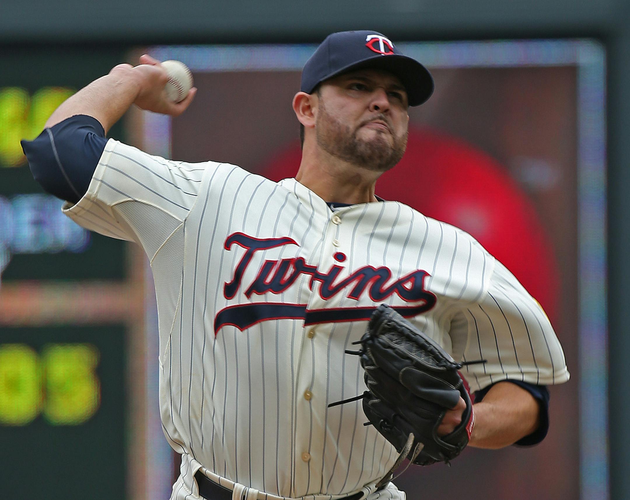 (left to right) Twin's Ricky Nolasco ptiched to the Royals in early innings.] Minnesota Twins vs Kansas City, Target Field, 4/12/14. Bruce Bisping/Star Tribune bbisping@startribune.com Ricky Nolasco/roster.
