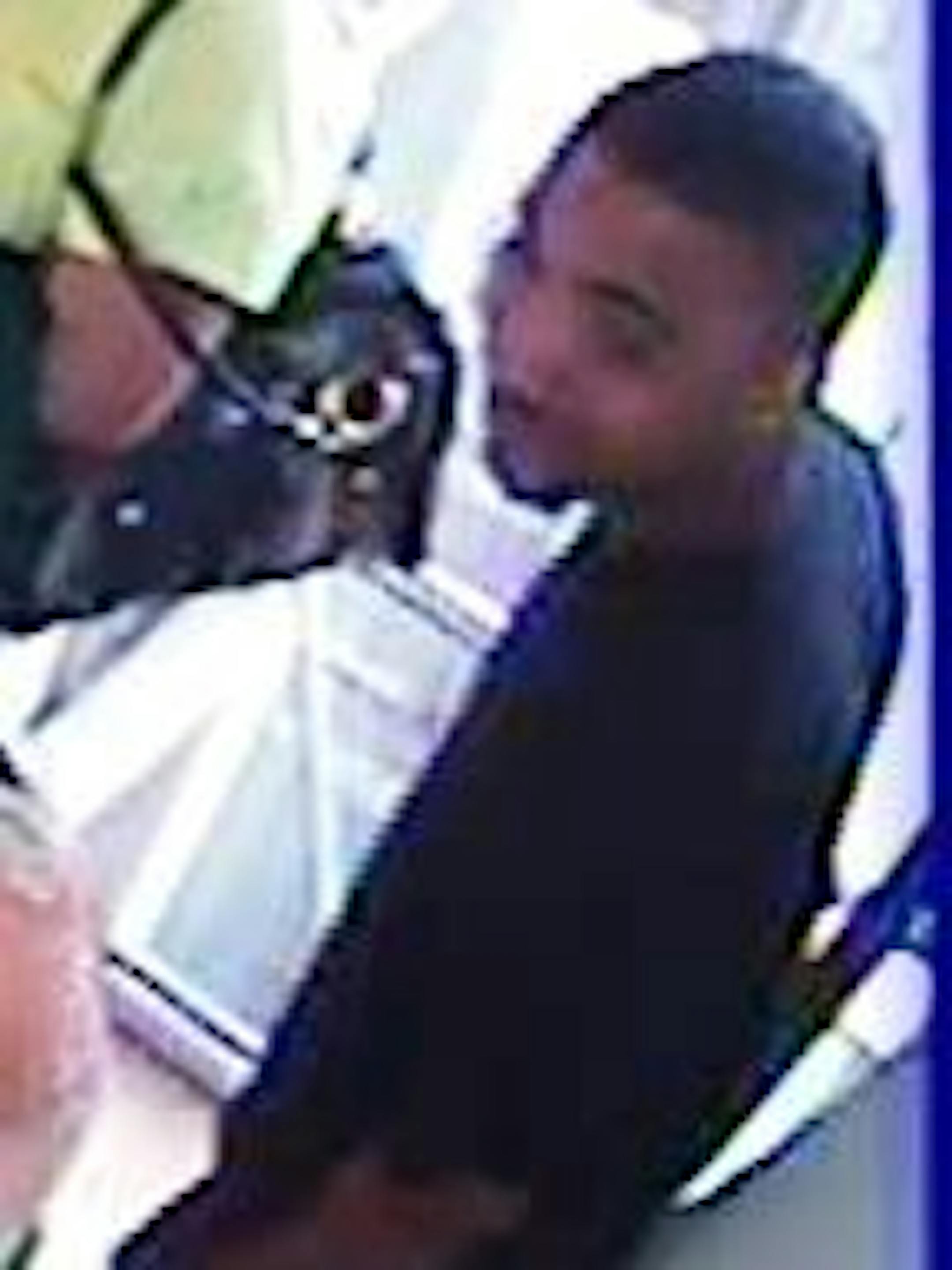 Police are seeking help in identifying this man, suspected of shooting a library patron in the back.