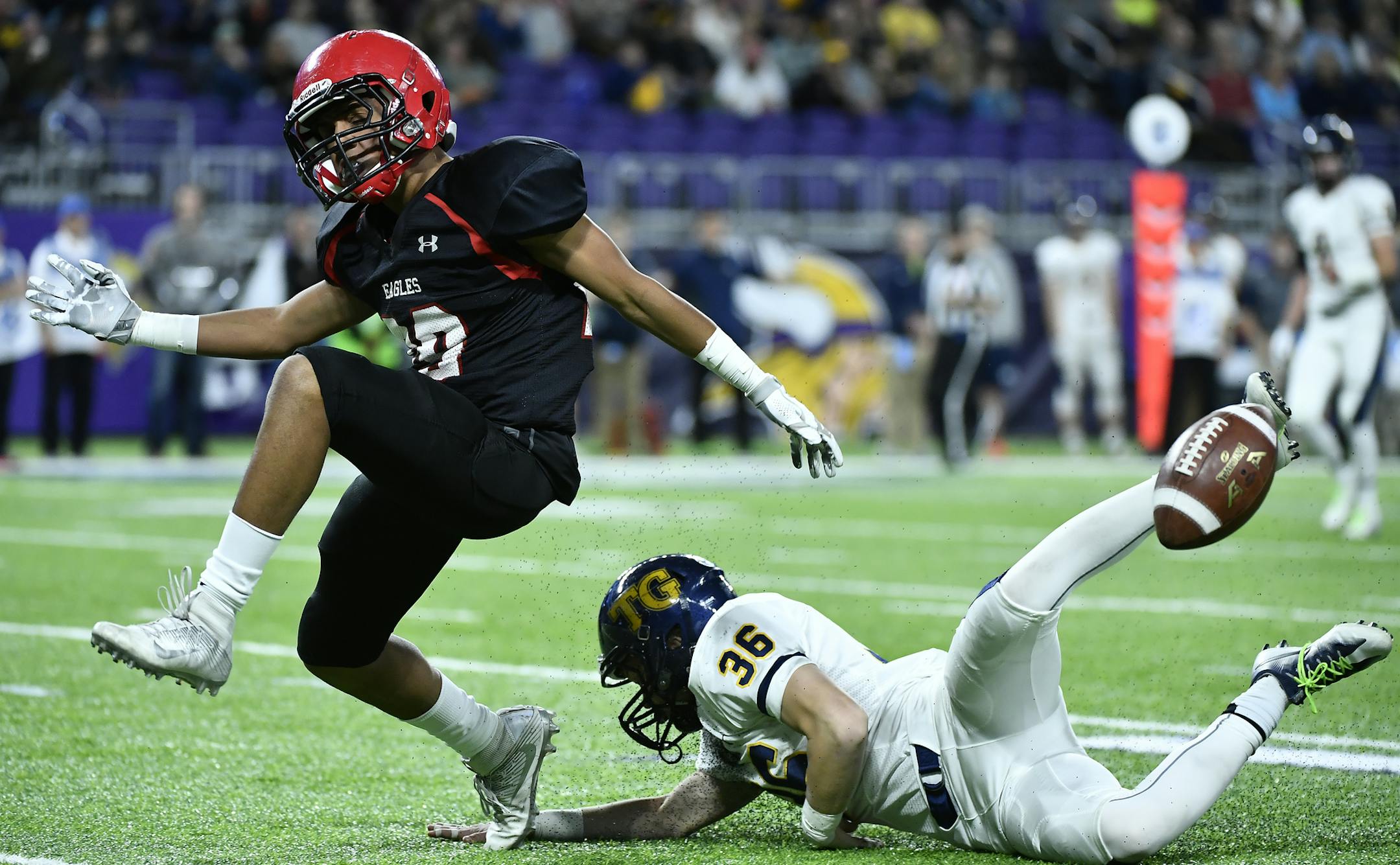 Eden Prairie receiver Daejon Wolfe (29) was unable to come up with a reception while being defended by Totino Grace cornerback Eric Moynagh ( 36) in the first quarter. ] (AARON LAVINSKY/STAR TRIBUNE) aaron.lavinsky@startribune.com Eden Prairie played Totino Grace in the Class 6A Championship Game of the the Prep Bowl on Friday, Nov. 25, 2016 at U.S. Bank Stadium in Minneapolis, Minn.