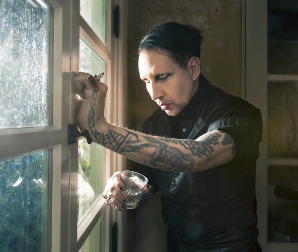 -- PHOTO MOVED IN ADVANCE AND NOT FOR USE - ONLINE OR IN PRINT - BEFORE JAN. 18, 2015. -- Marilyn Manson in West Hollywood, Calif., Dec. 11, 2014. At 