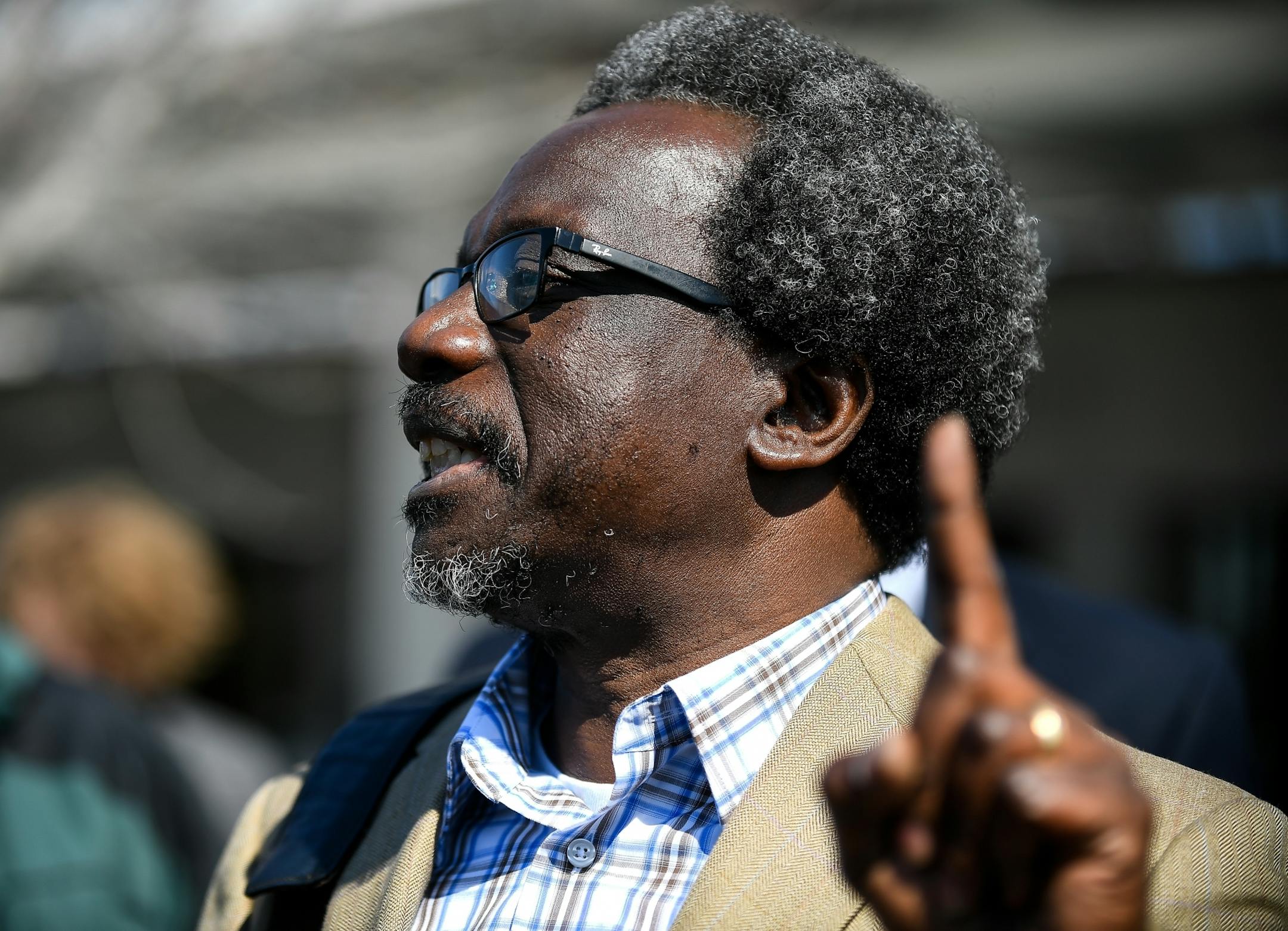 Augsburg Professor Mzenga Wanyama addressed the media and his supporters before attending a meeting with ICE Thursday to discuss the agency's plans for his deportation.