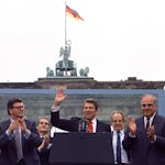 In this June 12, 1987 file photo U.S. President Reagan acknowledges the crowd after his speech in front of the Brandenburg Gate in West Berlin,  where