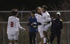 Stillwater's Miguel Caravias (17) celebrated his second half goal with Spencer Scott, who had the assist. At left was their teammate Kohei Adams. ] JE
